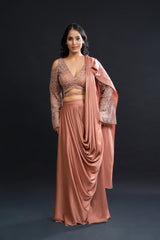 Woman wearing a pink traditional outfit with a black background